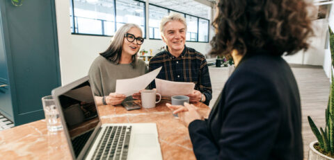 Financial advisor meeting with clients